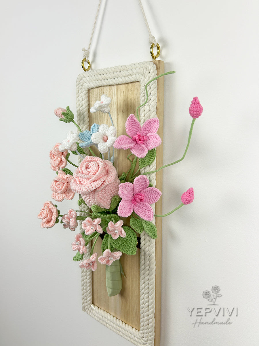 Finished crochet flowers with wood wall hanging. Pink rose and clematis arrangement wall art.